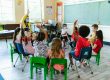 Kinder im Stuhlkreis bei der Mitbestimmung